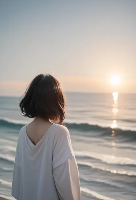 arafed woman looking out at the ocean at sunset