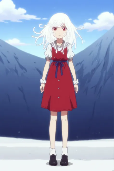 a woman in a red dress standing in front of a mountain