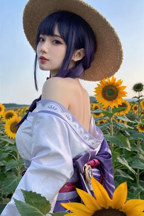 a close up of a woman in a hat standing in a field of sunflowers