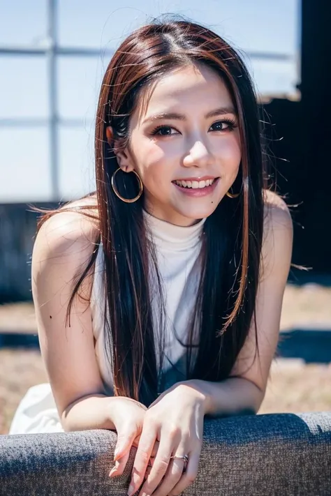 a close up of a woman sitting on a couch with a smile