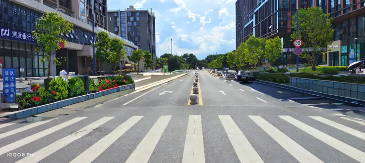 Walkway paved with red bricks,Cement road,White road markings