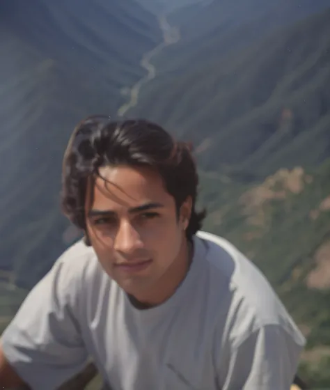 there is a young man sitting on top of a mountain overlooking the valley, em uma montanha, no topo de uma montanha, na montanha,...