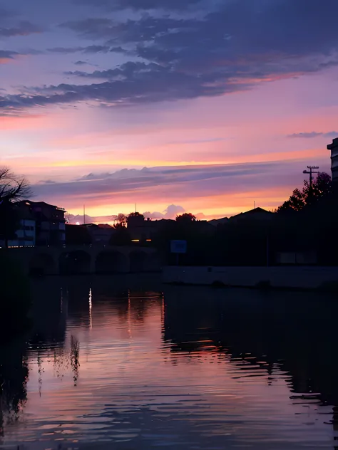 Sunset over the river，In the background is a bridge and a building, beautiful and spectacular dusk, sunsettime, pink sunset hue, The most beautiful sunset, dusk setting, beautiful dusk, Evening sunset, Sunset in the background, nice sunset, real sunset, Su...