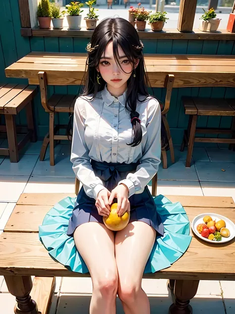 Long hair makeup woman sitting in front of table looking at fruit in hand，