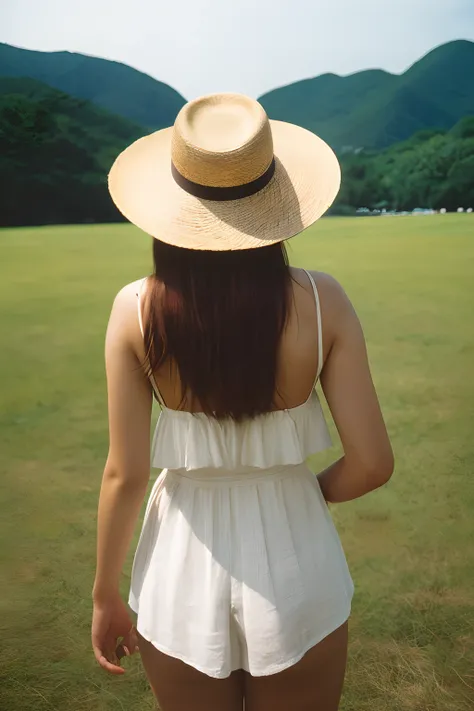 Rear view、a straw fedora hat, film stock photograph ,4 Kodak Portra 400 ,Camera F1.6 lens ,Rich colors ,Hyper realistic ,Lifelike texture, Dramatic Lighting , cinestill 800,