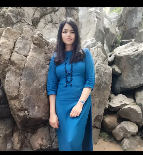 arafed woman standing in front of a rock wall with a blue dress, photo taken in 2 0 2 0, by Max Dauthendey, profile pic, profile picture, taken in 2022, inspired by Kailash Chandra Meher, in front of a forest background, full body photogenic shot, candid p...