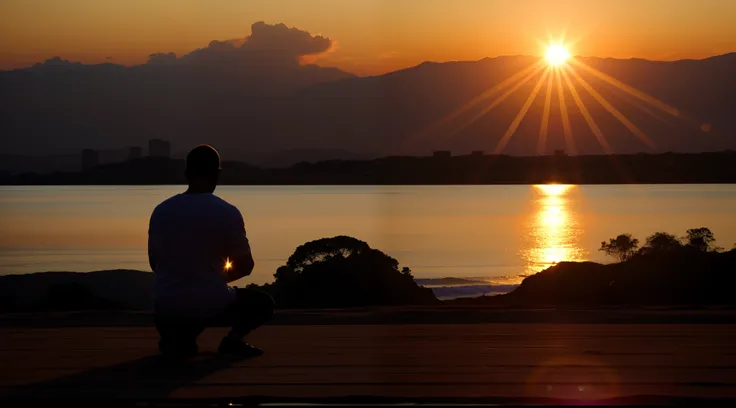 Image of an individual kneeling in prayer, com o sol nascendo ao fundo.