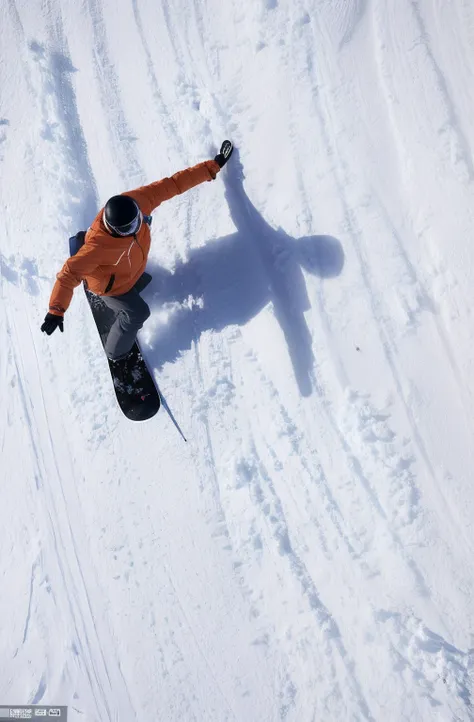 Alashi snowboarder in orange jacket with shadow of man on slopes, Steep, Overhead, skidding, Holding skis, skiing, illinois, air shot, Overhead shot, february), taking from above, Skilled, mid air shot, top down shot, action sports, istock, high angle clos...