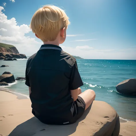 Blonde 10 year old boy sitting on a rock facing the sea at the beach, the view is from behind