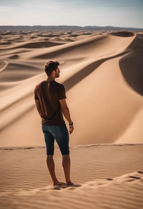 25 yo guy, with (brown) hair, seen from behind, watching desert during day, very big dunes, ultra realism, 8k, masterpiece, zoom out, blue sky, black tshirt, tattoed arms, cinematic