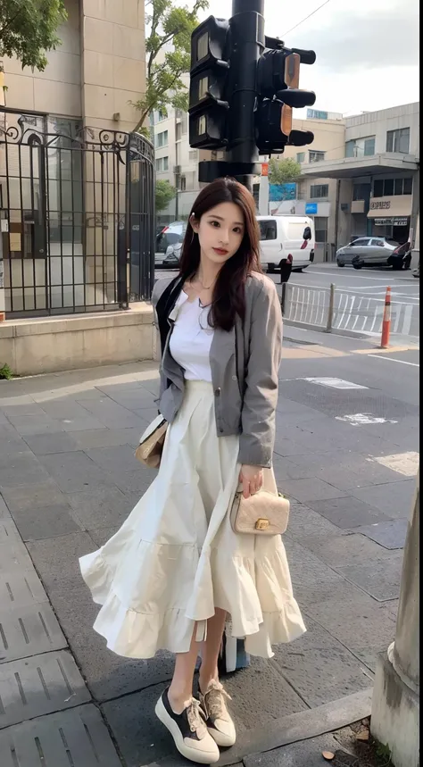 Woman standing on sidewalk with purse and shoes, dressed with long fluent clothes, wearing jacket and skirt, short skirt and a long jacket, wearing elegant casual clothes, cropped shirt with jacket, korean womens fashion model, Gray color, white trendy clo...