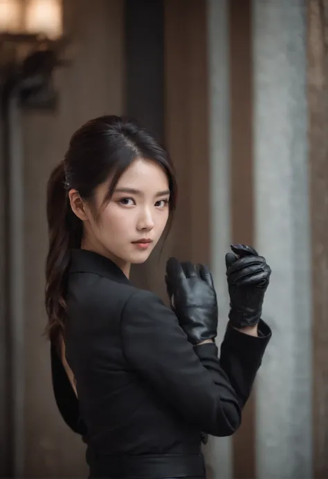 Japanese girl wearing a black three-piece suit up to mens shirt, black leather gloves in both hands, black hair ponytail