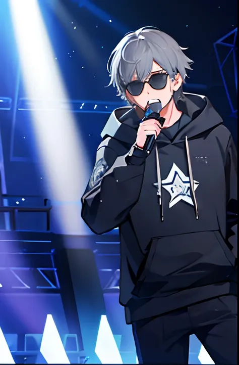 a boy with grey hair singing on stage with light show, wearing a hoodie and sunglasses while holding a mic