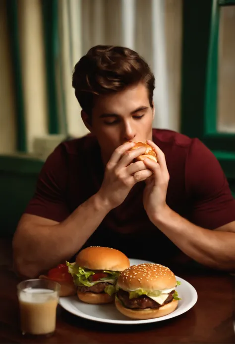 Take a picture of Nathan eating a hamburger