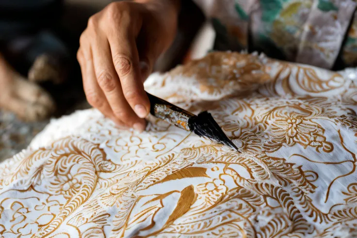 someone is cutting a piece of fabric with a knife, batik, delicate and precise brushwork, intricately detailed artwork, intricately detailed markings, intricate painting, beautiful craftsmanship, intricate detailed painting, unique and intricate painting, ...