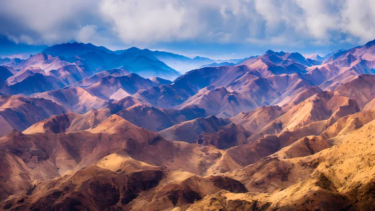 Layer after layer of mountain ranges in the Himalayas in atmospheric late afternoon cinematic light, photographic, ultrarealistic, high detail, atmospheric fog