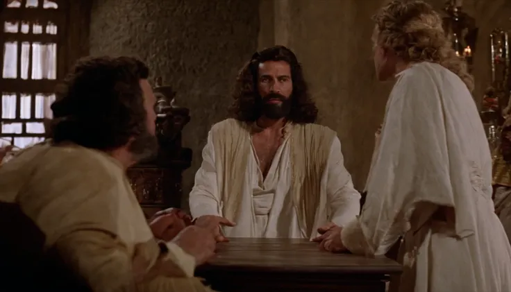 A spiky man with a beard and a white robe sits in the room, Gal Yosef, Screenshot from the 1983 film, Still in the rainbow opanie, 1 9 7 3 A scene from the movie, Movie Screenshots, Jesus of Nazareth, VHS Screen Capture, screenshot from a movie, a scene fr...