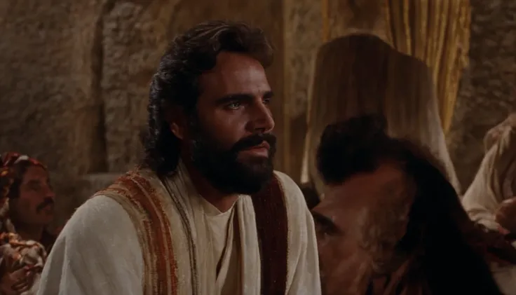 A spiky man with a beard and a white robe sits in the room, Gal Yosef, Screenshot from the 1983 film, Still in the rainbow opanie, 1 9 7 3 A scene from the movie, Movie Screenshots, Jesus of Nazareth, VHS Screen Capture, screenshot from a movie, a scene fr...