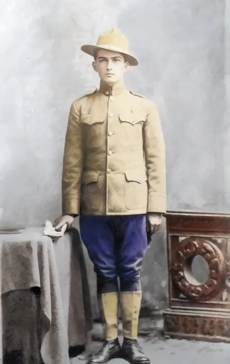 Homem de uniforme ao lado de uma mesa com uma cadeira, colorido, uma foto colorida, fotografia colorida, foto colorida, colorido, hand - tinted, colorido, 1 8 0 0 s soldado, foto colorida premiada, em uniforme de soldado, colorido 1 9 0 4 foto, fundo color...