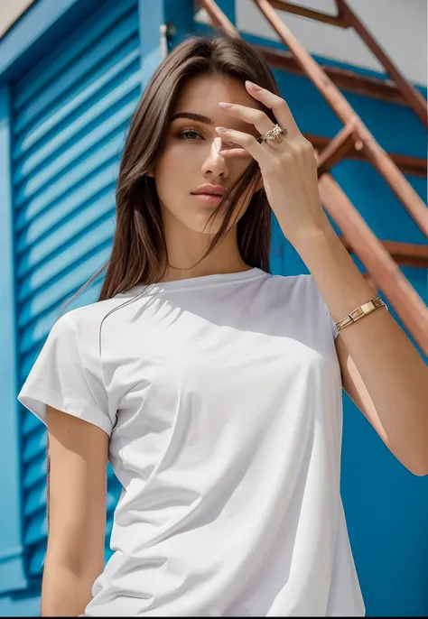 Beautiful woman in white shirt standing in front of a blue building, camiseta branca, T-shirt branca, camiseta branca, vestido com uma camiseta branca, tshirt branca lisa, vestido com uma camiseta branca, victoria siemer, vestindo uma camiseta, camiseta mo...