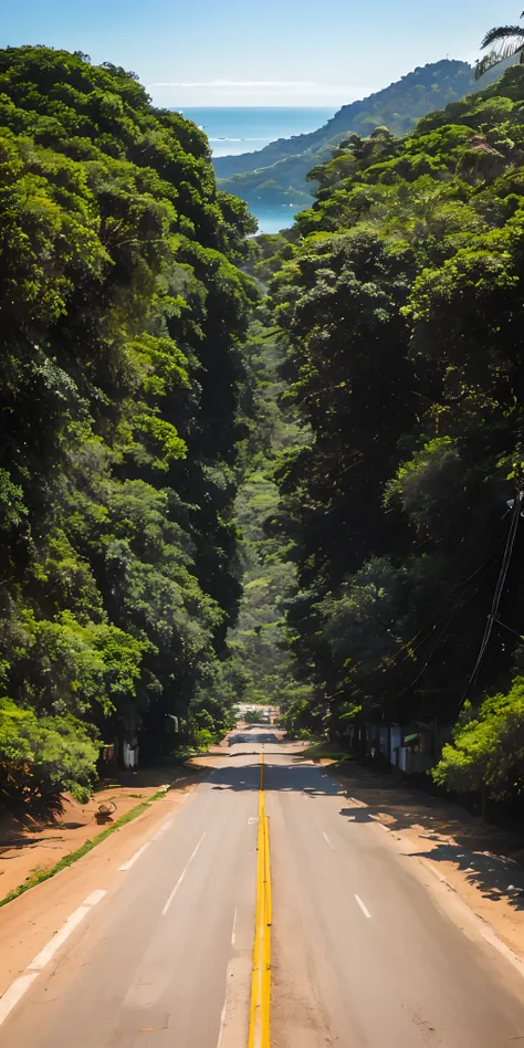 Fotografia estrada em uma montanha com mar de fundo