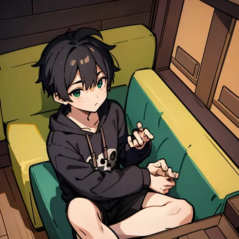 Messy black haired boy in a black skull outfit and green shorts sitting on a sofa thinking