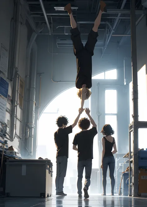 girl with shoulder length brown hair, guy with short, but super curly blonde hair, and guy with short brown fluffy hair lined up doing a handstand with face away from camera