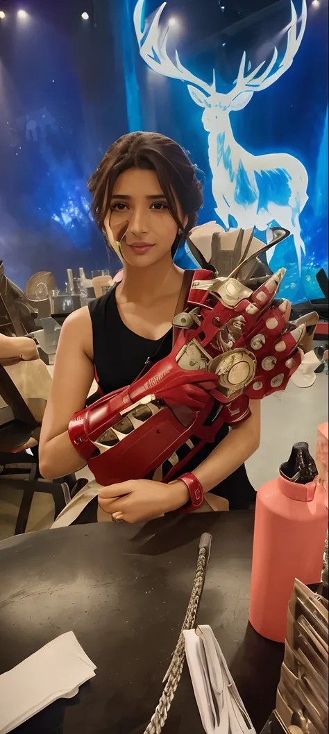 Theres a woman holding a red glove with a deer on it, Manopla do Infinito, Manopla Tema Guerra, segurando um par de ventiladores. irreal 5, cosplay realista, Manoplas, prosthetic arm, usando armadura thanos, hand model, usando manopla de metal, by John Luk...