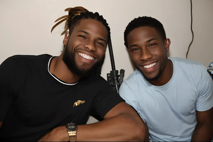 there's two men sitting next to each other smiling, josan gonzalez e tyler edlin, taken in the early 2020s, taken in the late 20...