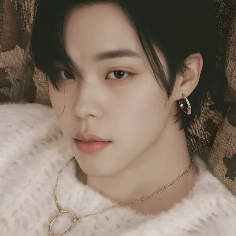 A closeup of a person lying on a sofa with a sweater, JiminNariz grego, Jimin, Jimins right eyelid swollen, JiminPlump lips, Parque Jimin, Kim Doyoung, Jung Jaehyun, Rosto Jimin preciso, Hyung Tae, Hsiao-Rony, Jinyoung Canela, Retrato de Jossi de Blackpink