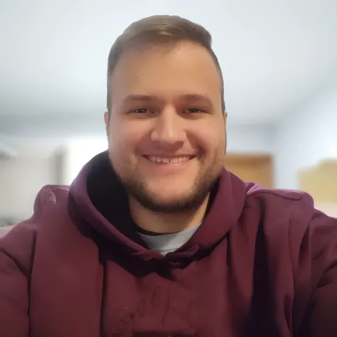 Smiling man in brown jacket sitting in front of a laptop computer, Fotografia selfie 8k, Streamer do Twitch / Jogador Ludwig, he is wearing a brown sweater, sem barba, imagem profissional, Homem de 30 anos, foto de perfil headshot, foto de perfil profissio...