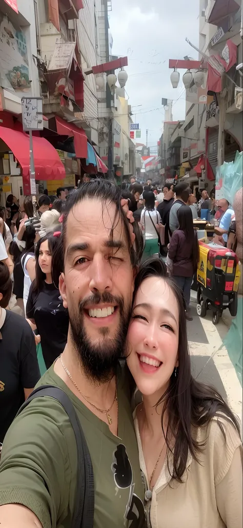 Smiling couple posing for a photo in a crowded area, Directed by: Nandor Soldier, edu souza, Directed by: Luis Miranda, Directed by: Felipe Seade, imagem de perfil, Directed by: Samuel Silva, Directed by: Emerson Silva, andrea rocha, Directed by: Willian M...