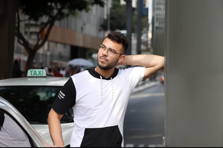 Theres a man standing on the side of the road near a car, In Sao Paulo, posando em uma rua urbana, Tomada com Canon 8 0 D, Na rua, Na rua, em uma rua, outlive streetwear collection, Tirado com Canon EOS 5 D, São Paulo, sao paulo, inspired by Antônio Parrei...