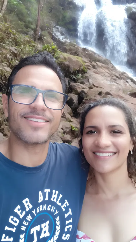 There is a man and a woman in front of a waterfall, david rios ferreira, imagem de perfil, Directed by: Willian Murai, Directed by: Nandor Soldier, 3 5 year brazilian mother, imagem do avatar, foto do perfil, Directed by: Felipe Seade, Malika Favre, Direct...