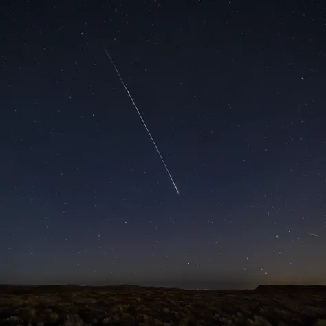 Photography showcasing a stunning meteor shower illuminating the night sky. Countless meteors streak across the darkness, leaving trails of shimmering light in their wake. The photograph is captured from a wide-angle perspective, capturing the vast expanse...