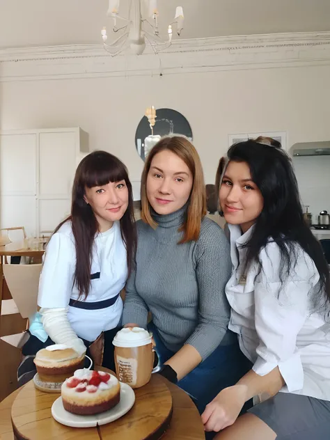 Large table, with coffee, Cakes, Behind the girls the apartment is beautiful, Light