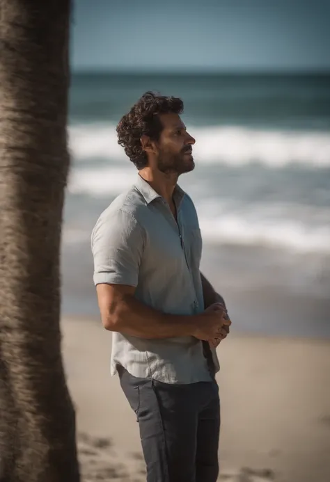 Homem sentado na praia