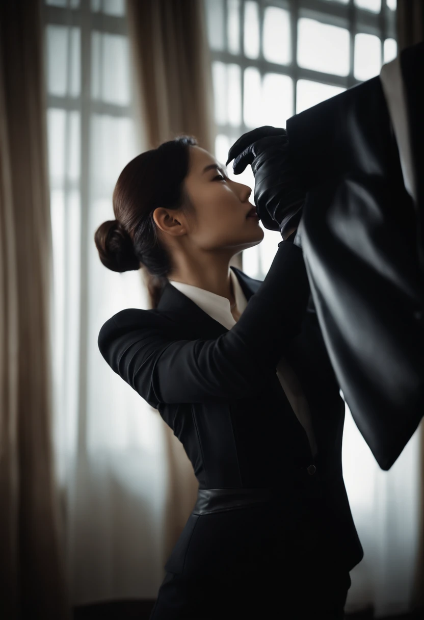 Young Japan woman lifting black suit onto shirt, Black leather gloves worn on both hands, Hands of woman in black suit and black leather gloves in front of you