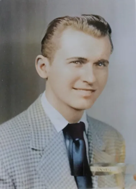 arafed photo of a man in a suit and tie holding a glass, around 1 9 years old, a colorized photo, taken in the early 2020s, old ...