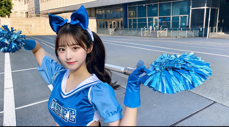 Beautiful 18 year old cheerleader in light blue costume