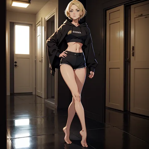 A beautiful, barefoot, blonde, shorthaired,  woman, wearing black shorts and a tight black croptop with a hood, standing on the floor.