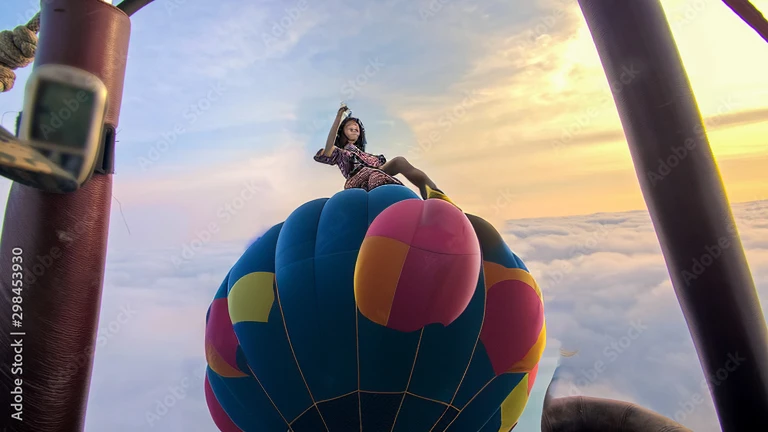 ((top-quality、in 8K、​masterpiece:1.3、Raw photo))、((Japanese female idol riding a hot air balloon)), Super high quality photos, Hot air balloon flying high above the vast jungle, Under the balloon is a vast tropical jungle, (Photorealistic: 1.4), (hyper rea...