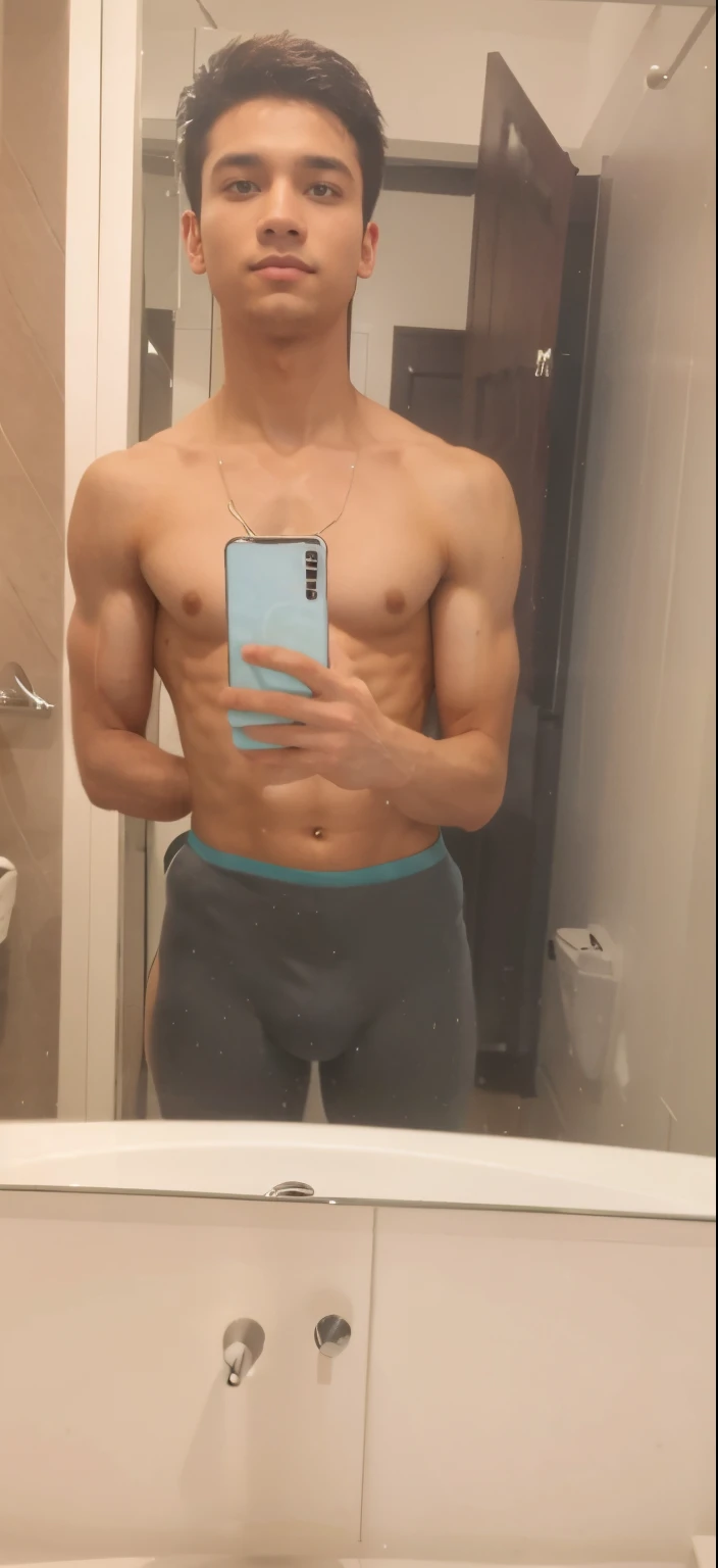 Six pack body infront of mirror with muscular body