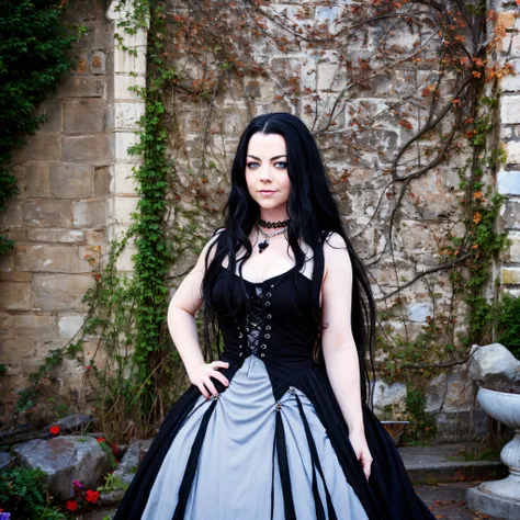 amy lee wearing a red/black gothic dress, outside at the castle courtyard