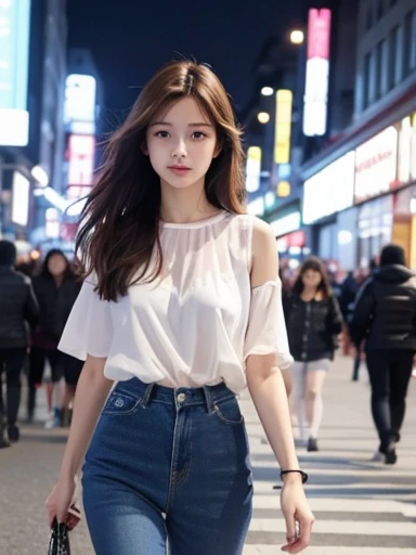 A young woman walks along a busy street but she is the prettiest.