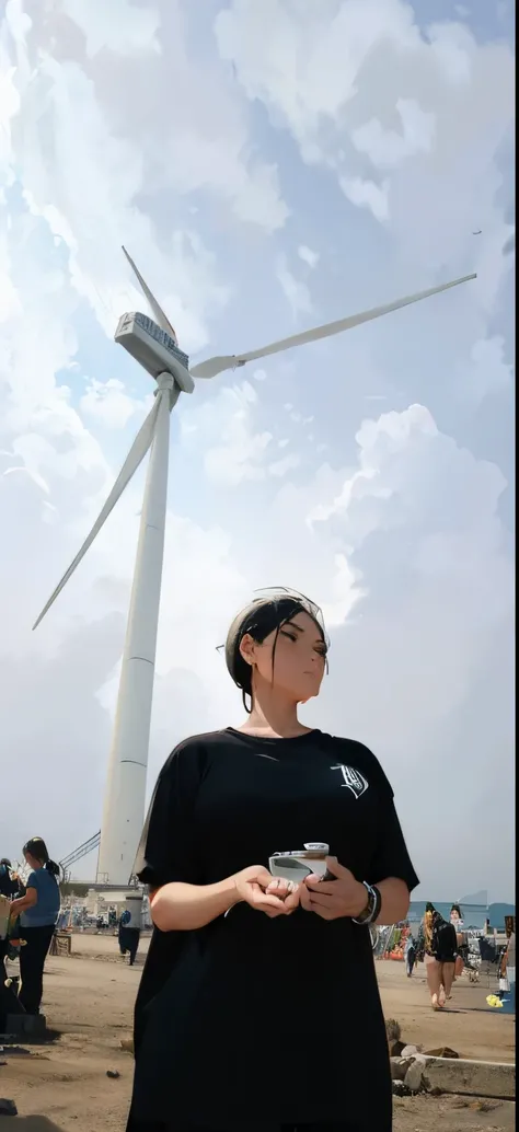 Blue sky and white clouds Huge windmill Beautiful woman in black T-shirt