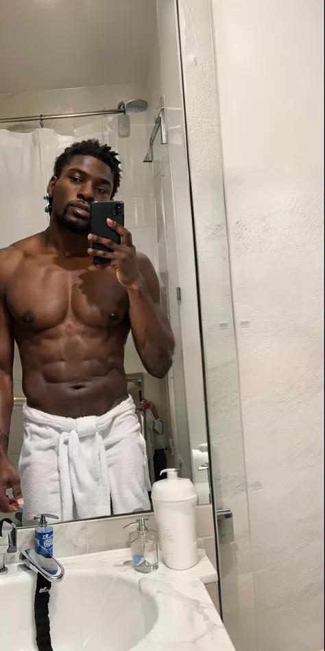 there is a man taking a selfie in a bathroom mirror, wearing a towel, loin cloth, taken in the early 2020s, 2 3 years old, around 1 9 years old, shirtless, 2 2 years old, fit pic, man is with black skin, 2 7 years old, 21 years old, black skin!!!, 2 4 year...