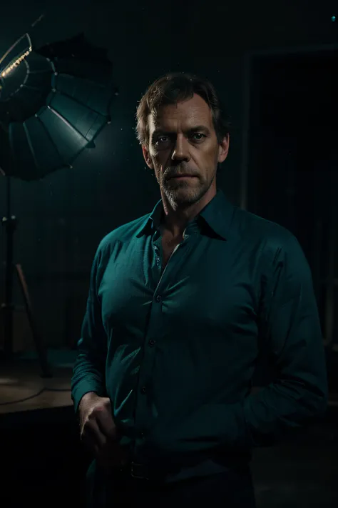 portrait of a award winning photo of hugh laurie posing in a dark studio, (rim lighting,:1.4) two tone lighting, sharp focus, teal hue, octane, unreal, dimly lit, low key,