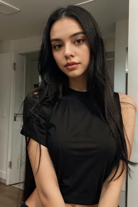 young lady with long straight black hair and full lips wearing black top