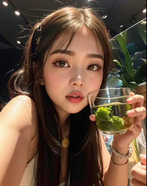 there is a woman holding a glass of water with a plant inside, jennie blackpink, parque roseanne do blackpink, jossi do blackpin...